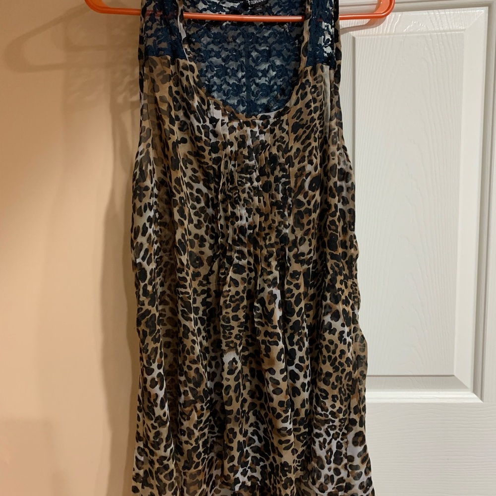 Super cute cheetah print tank! Blue lace detailing